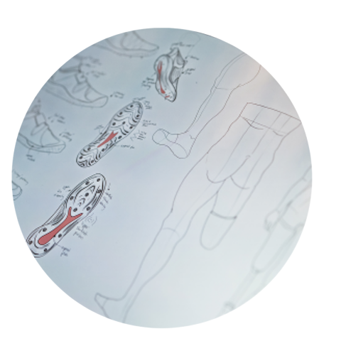 A design sketch of shoes and legs.